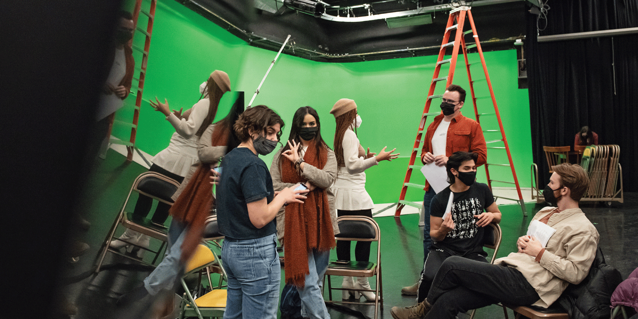 FTVM students gather around a green wall during production of student Ashley Morrow’s screenplay.