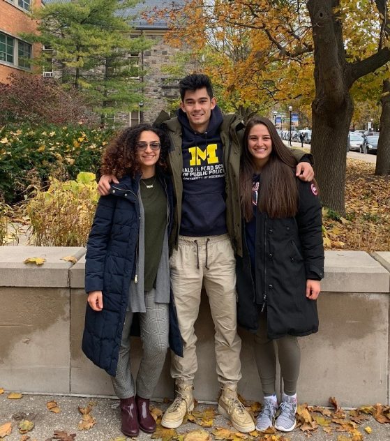 The three GoK Ambassadors stand in front of the LSA Building and Kelsey Museum of Archaeology on a crisp fall day.