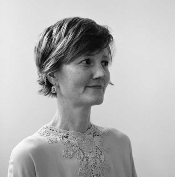 Black and white headshot of a woman 