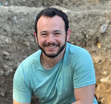 IPAMAA Alex Moskowitz in dig site trench