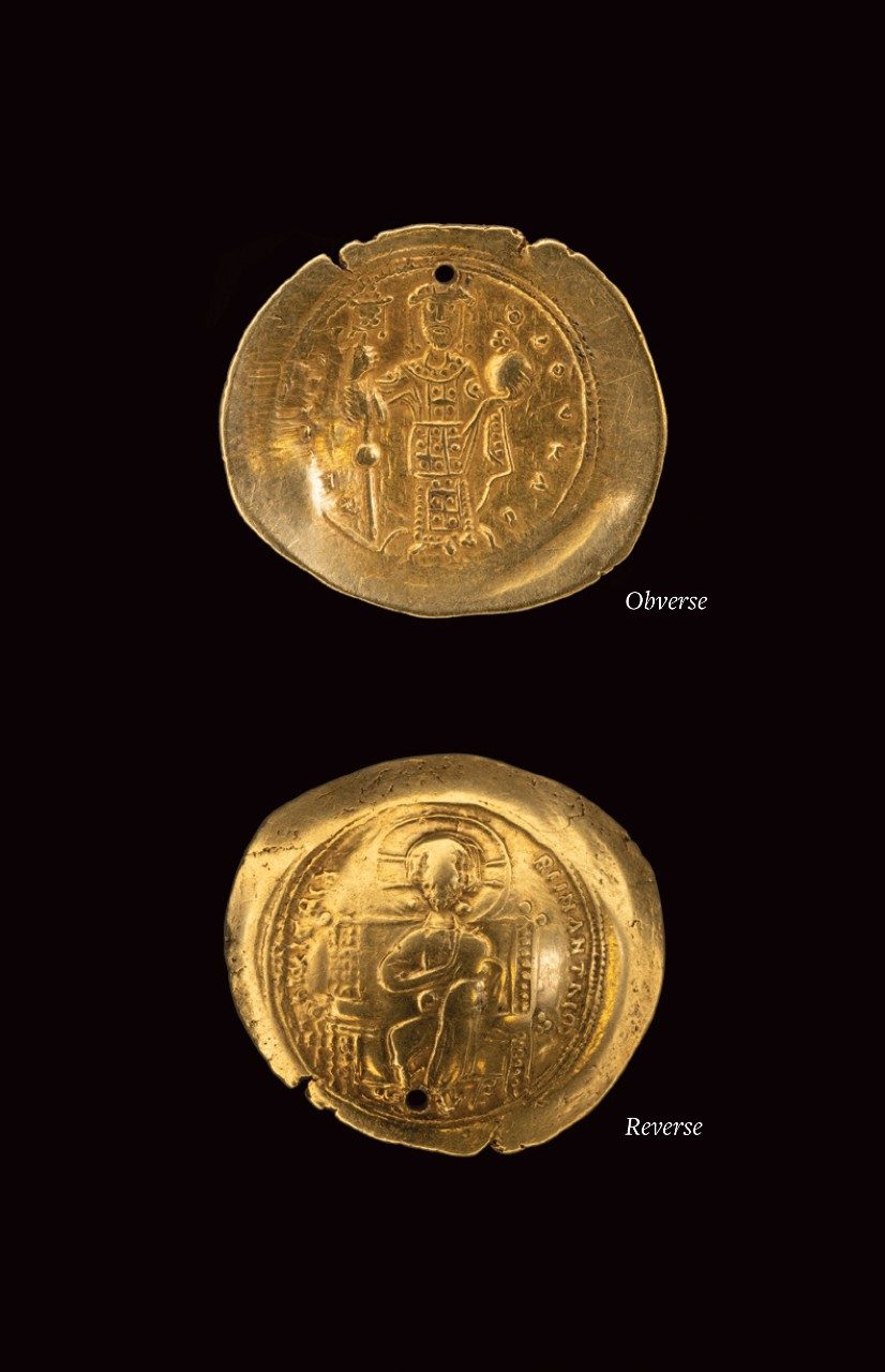 Collage of the front and back views of a gold coin; the left has a man standing with a cross, and the right has a haloed Christ sitting on a throne.