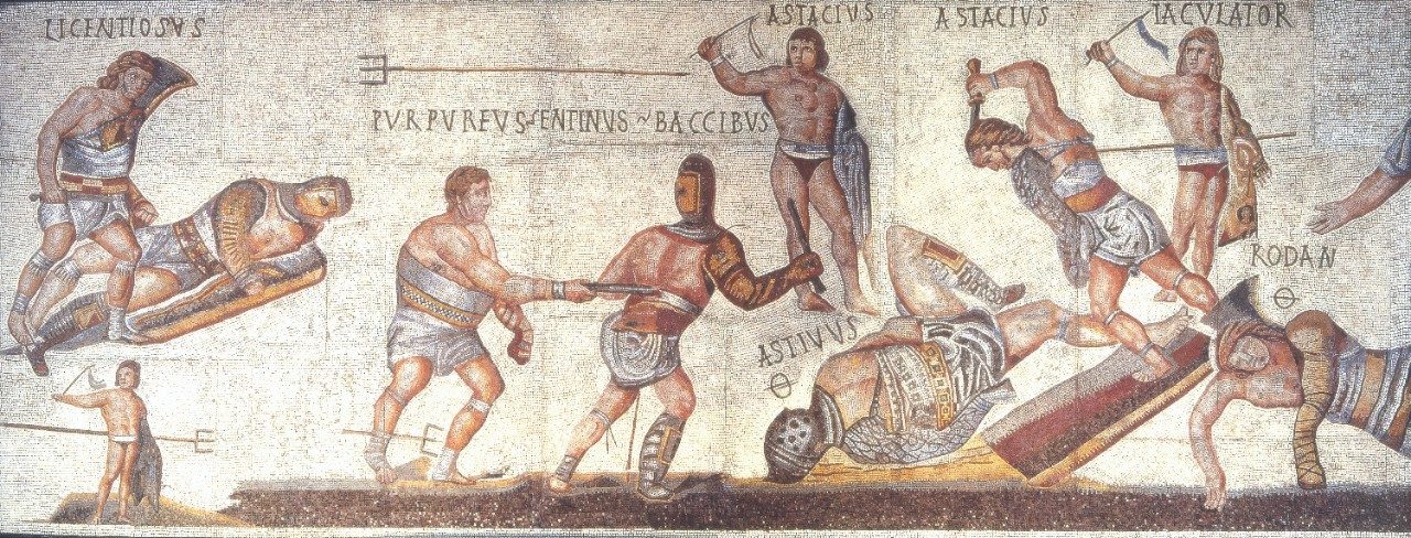 Mosaic image showing several gladiator fights in action. Men wearing various armor combinations wield a variety of weaponry. Some stand; some are fallen on the ground, injured or dead.