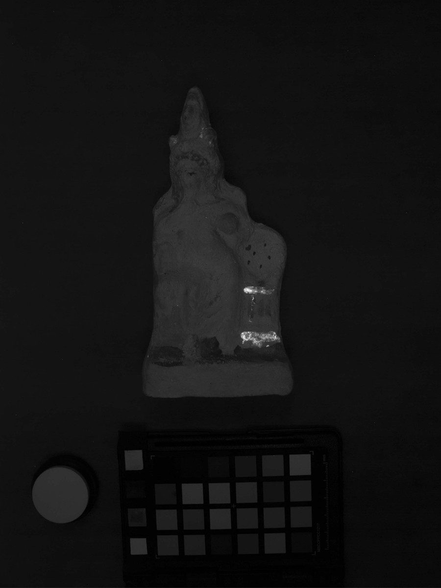 Ceramic dog figurine.