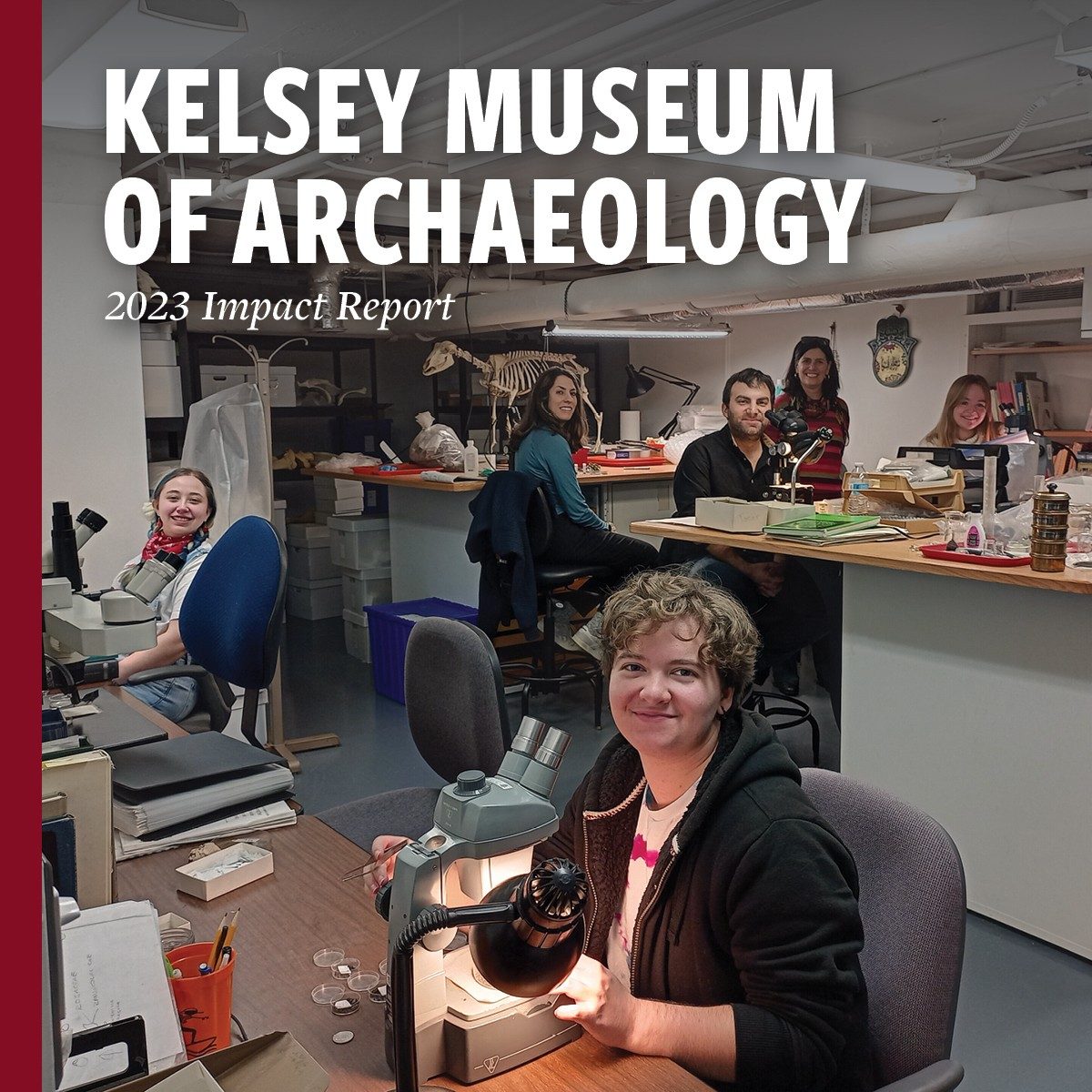 Front cover of the 2023 Impact Report, showing students in the Kelsey Museum’s Bioarchaeology Lab.