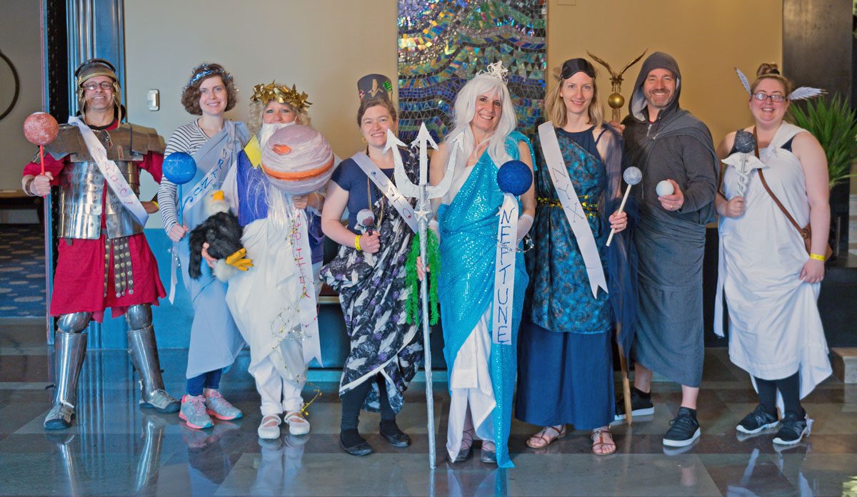 eight people in costume