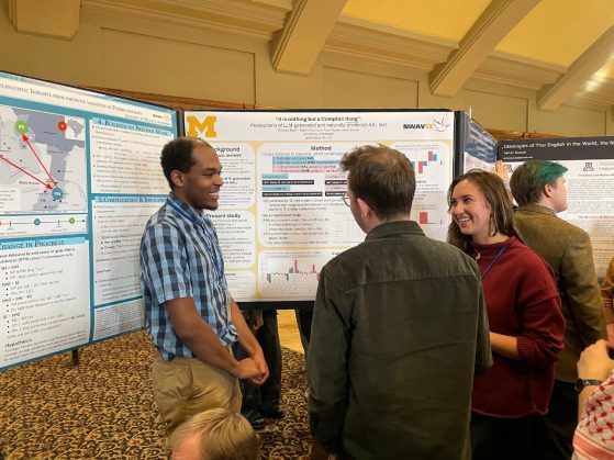 George Stain and Sophie Faircloth presenting poster