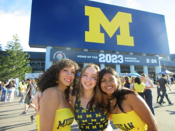 Picture of Lulu (center), with her MRADS friends Gen (on the left) and Rhea (on the right) at a football game earlier this year!