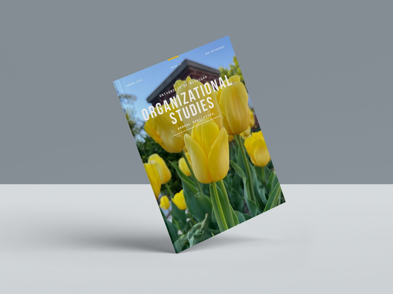 A magazine mockup of the 2021-2022 newsletter cover