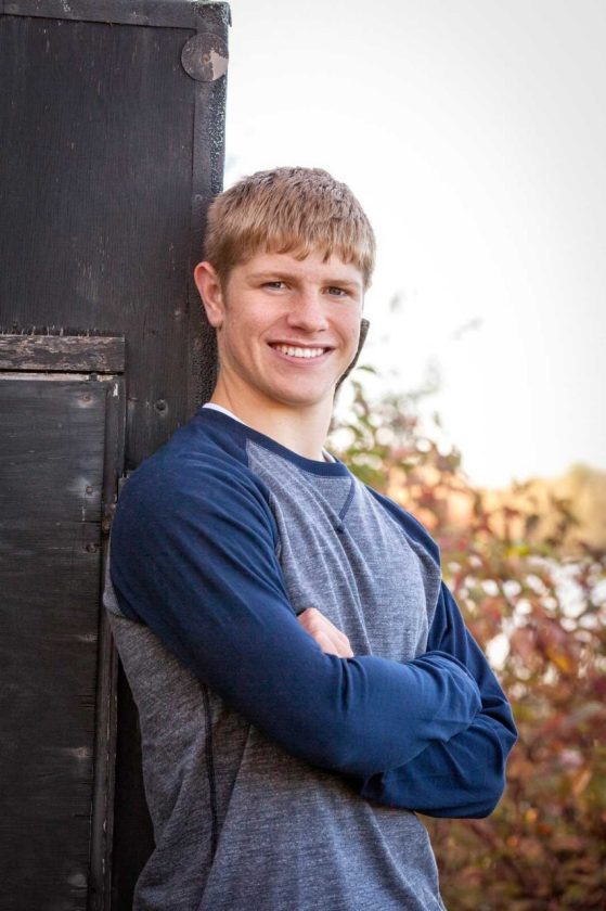 Benjamin Bogart in a dark and light blue shirt