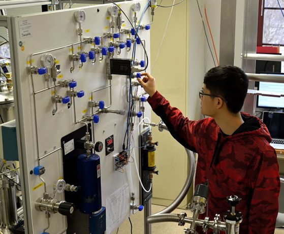 Physics undergraduate student Minjie Lei performs a measurement with the prototype Radon Removal system for the LZ gas circulation element at the University of Michigan.