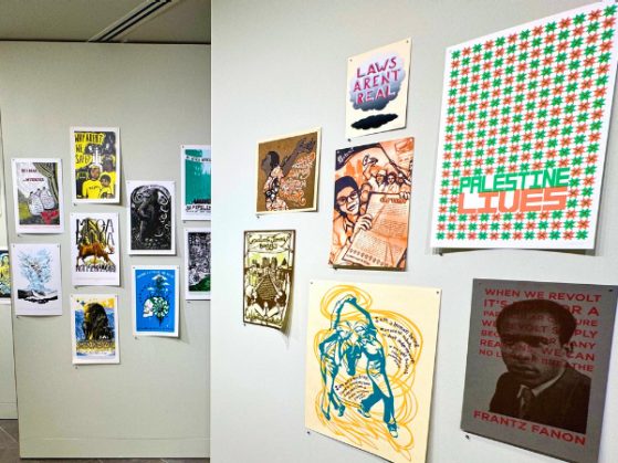 the walls of a gallery exhibit showing printouts and linocuts for a show
