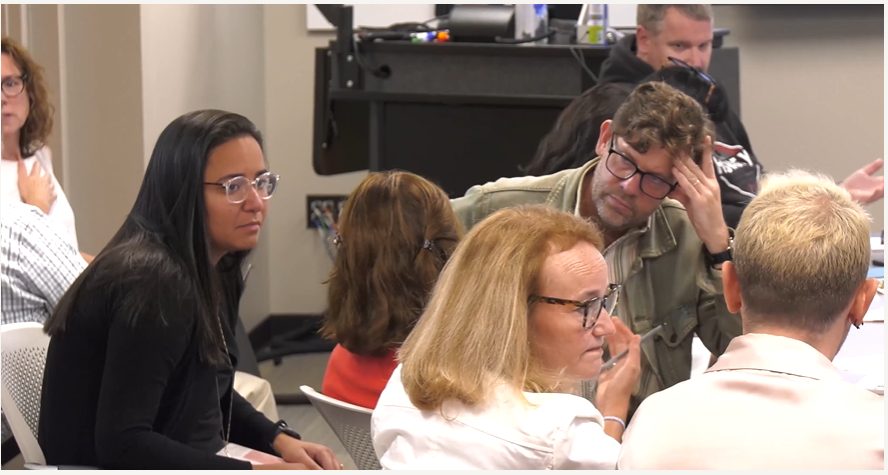 Participants discuss their topic in small groups