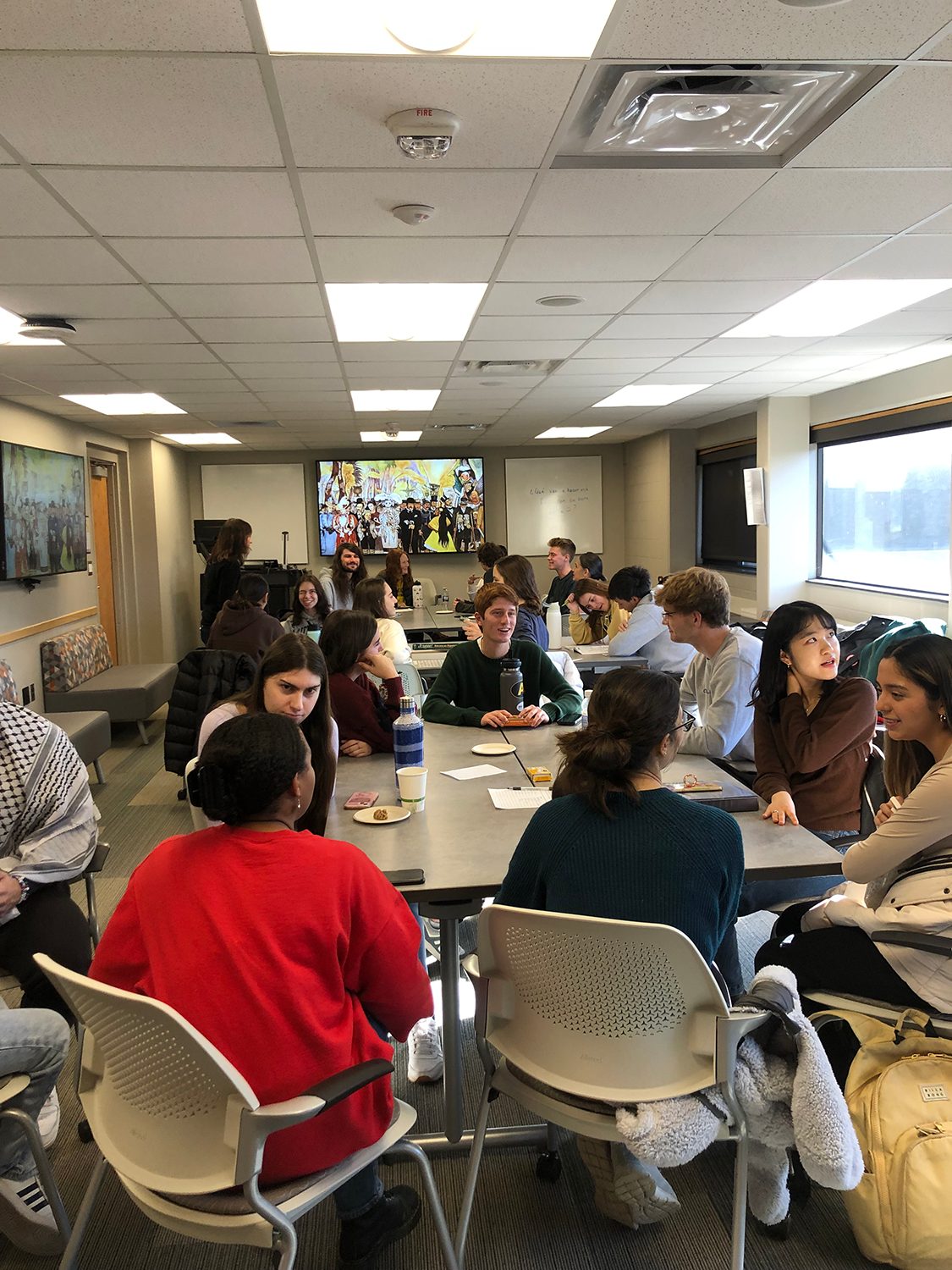 Spanish Students chat around a table