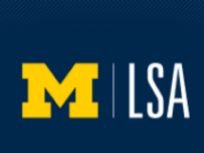 a maize block m on a blue background