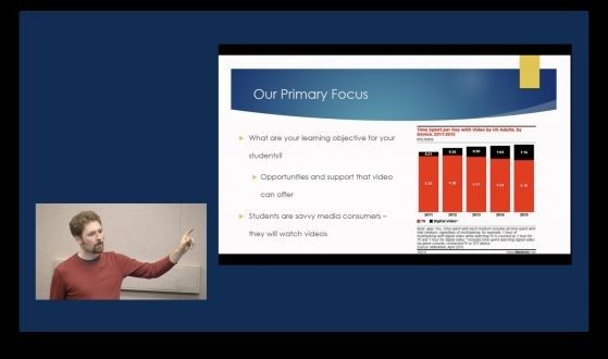 screen grab from video showing small window of lecturer and larger window with slide from presentation