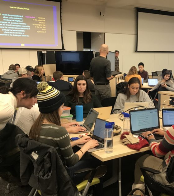 George Hoffman and class with students