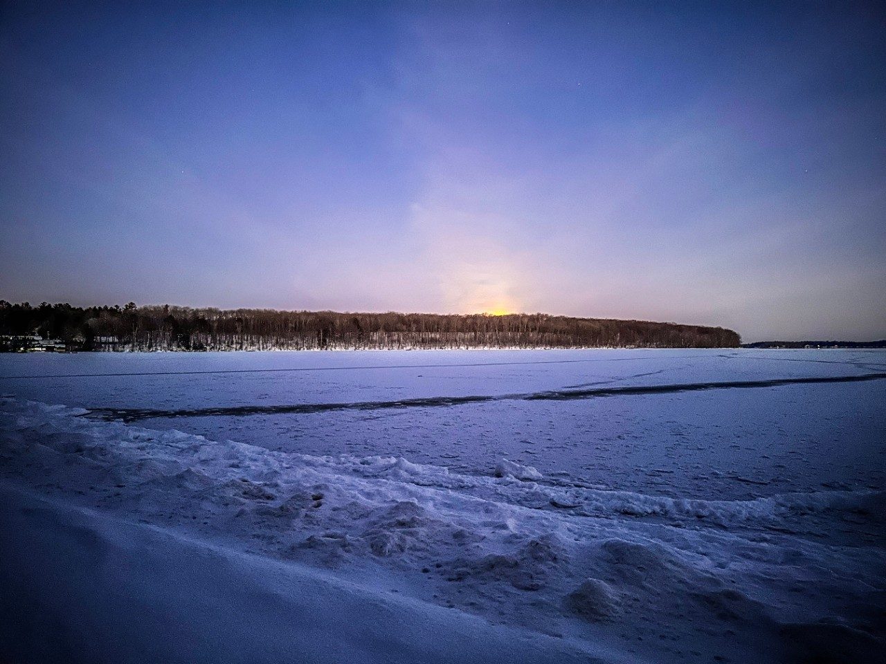 Iced-over lake and shoreline
