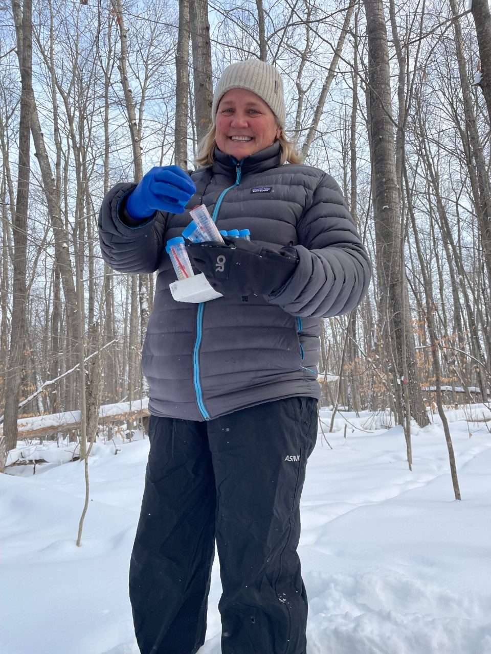 Woman in the snowy woods