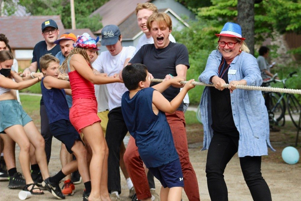 People grab a rope in a game of tug-of-war