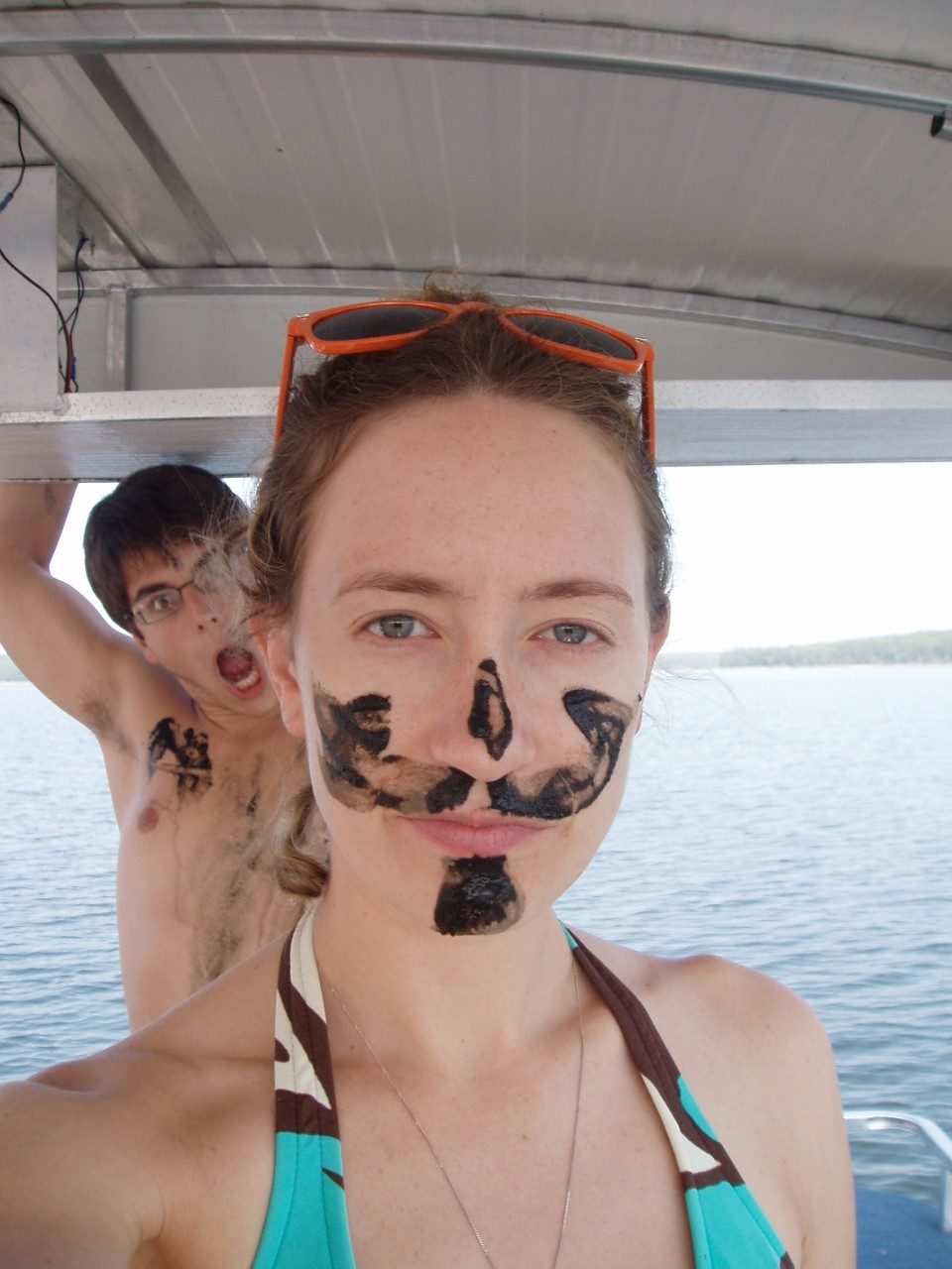 Woman with mud on her face