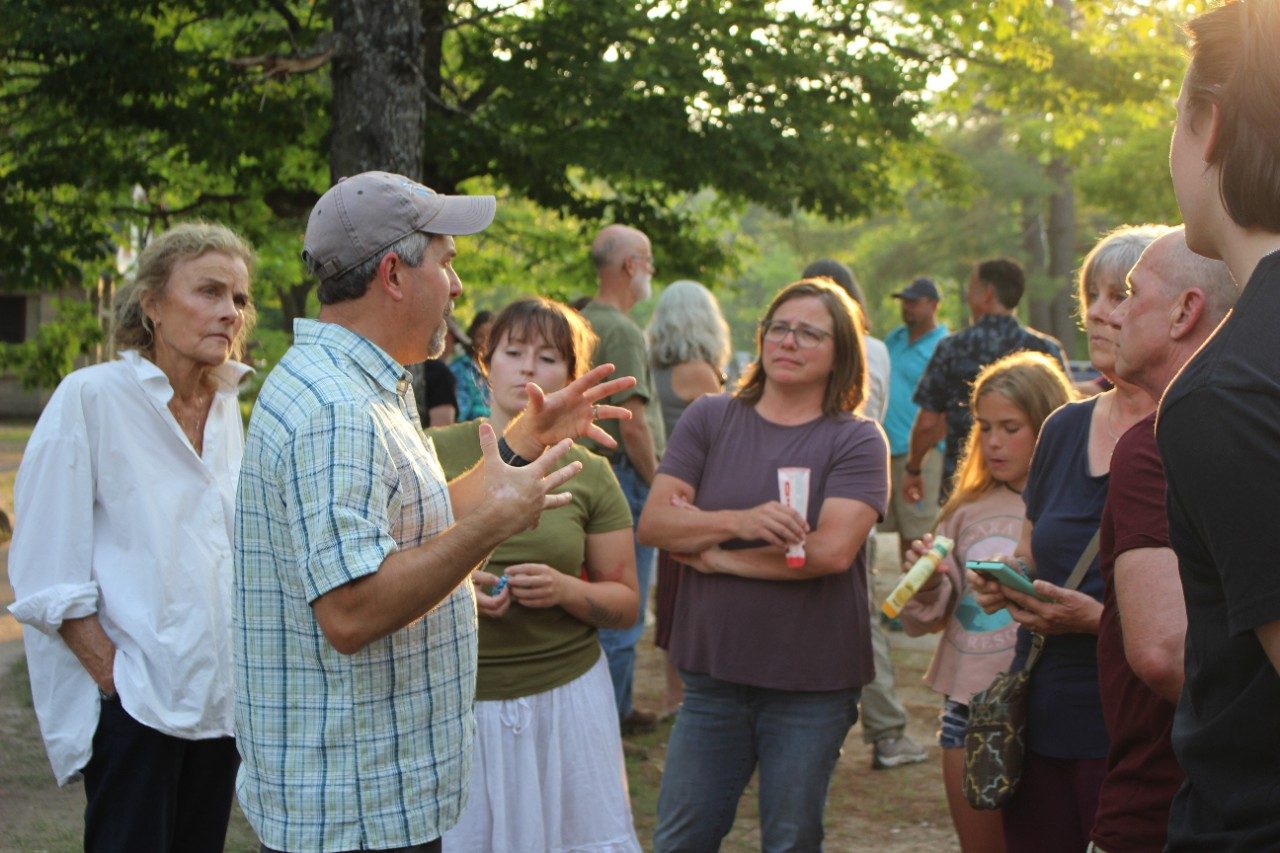 People talking outside in a group