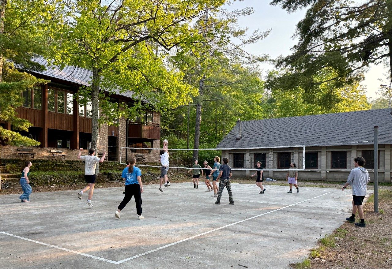 People playing volleyball outside