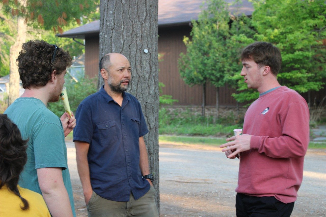 People talking in a group outside