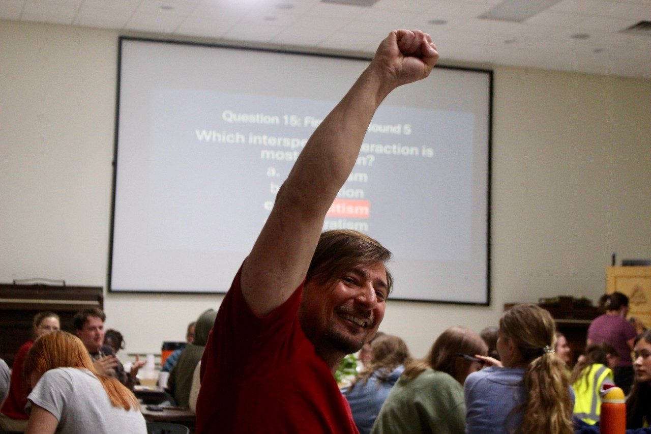 Person with an arm in the air in celebration