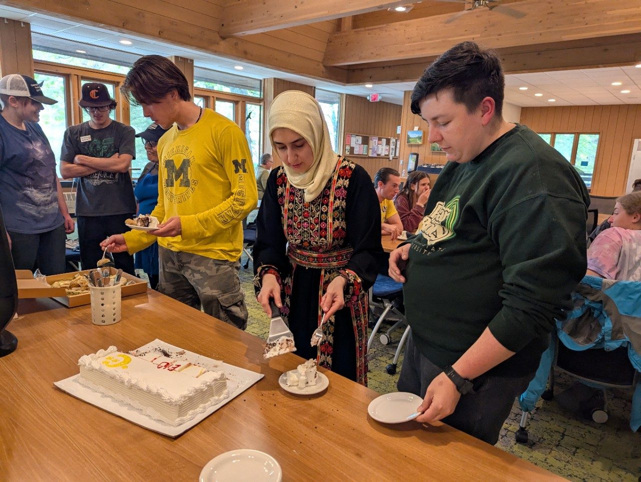 Person serving cake