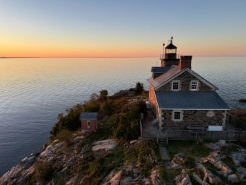 Lighthouse overlooking a big lake