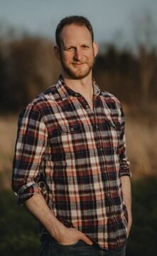 Man posing in a forest