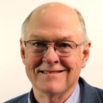 Head shot photo of a man in a studio