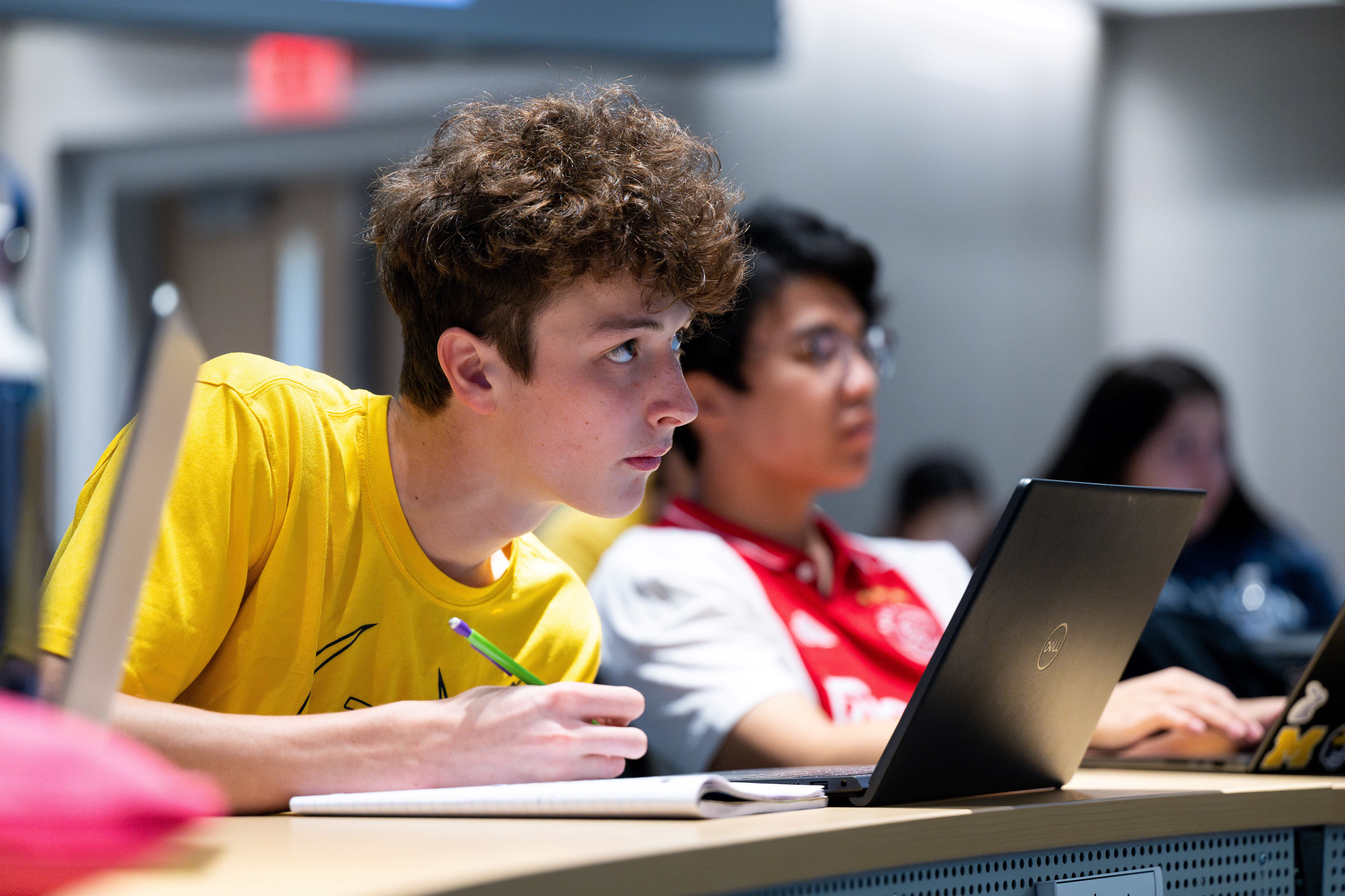 Students taking notes